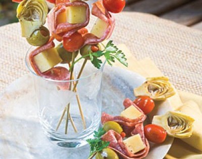 Italian Style skewers with cheese, salami, olives, tomatoes and artichoke